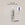 A bottle of ACURE Bonding Shampoo with a pump dispenser next to a circle showing the old packaging and a text calling out: New look, same proven formula